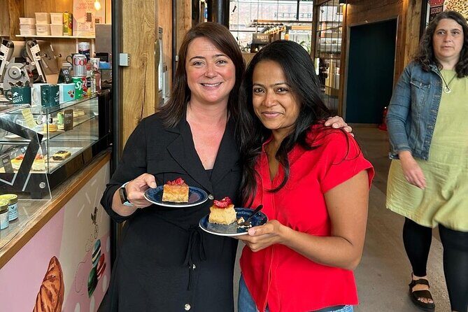 Chester Food Tour: Unique Food With Drinks & Sightseeing - Eastgate & the Chester Walls: clock photos and local producer tastings