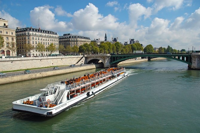 Day Trip to Paris with Eiffel Tower, Notre Dame and Louvre Museum - Seine cruise with audio guide: the calmer hour in the middle