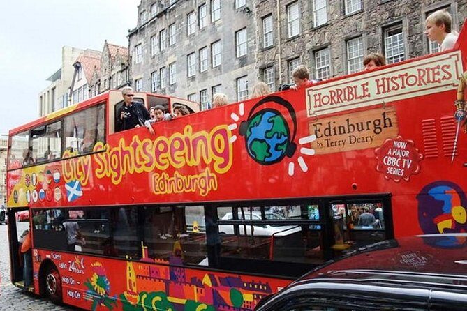 Edinburgh Rail Trip from London with Castle entry and Hop-on Hop-off bus - St Giles, the Royal Mile, and Old Town walking choices in one half-day