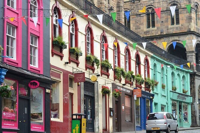 Edinburgh Rail Trip from London with Castle entry and Hop-on Hop-off bus - Princes Street Gardens and Princes Street views: New Town contrast