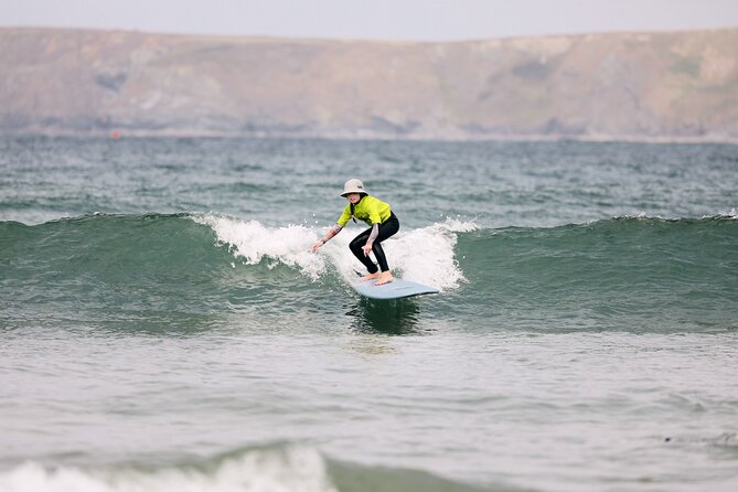 Half-Day (2hr) Surf Experience in Newquay - Beginners & Improvers - The “tail-hold” beginner method that helps you stand sooner