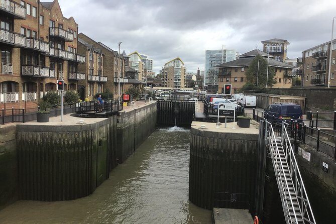 Historic walk of East Londons Wapping Docks and its famous Pubs - Turner’s Old Star and St Peter’s Church: art and religion in the same block