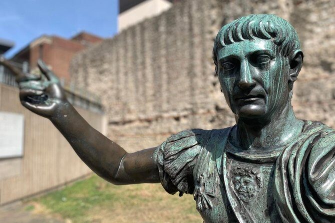Londinium's Footprint: Explore London's Roman wall on a self-guided audio tour - Behind the Leonardo Hotel: finding the Roman wall through a garage view