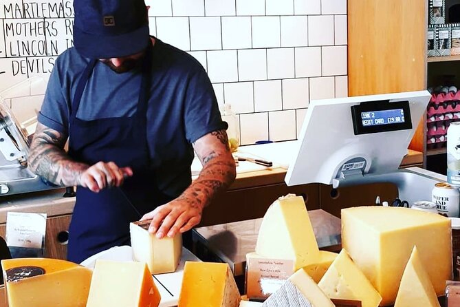 London Cheese Crawl & Walking Tour - Lina Stores Delicatessen in Soho: wine-paired drunk cheeses