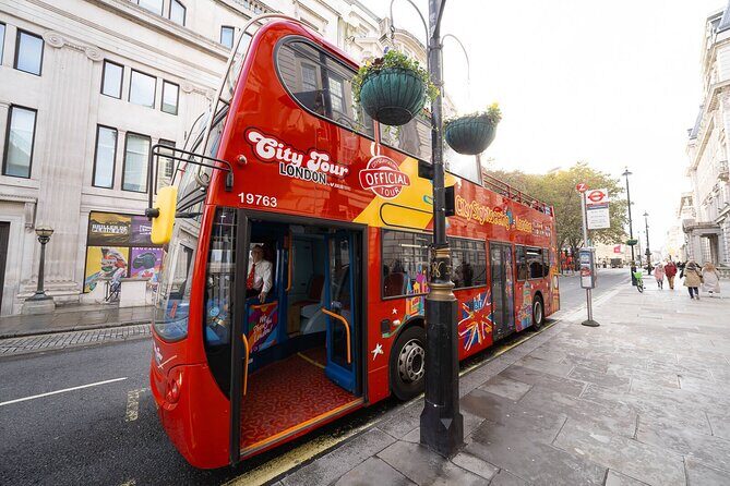 London Tour Hop-on Hop-off Bus with Optional Thames River cruise - Double-decker views, headsets in 13 languages, and Wi-Fi on board
