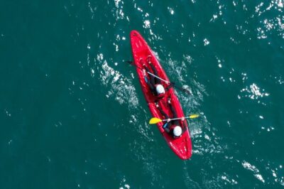 Newquay Kayaking Adventure - Getting kitted up: wetsuits and kayaks do the heavy lifting
