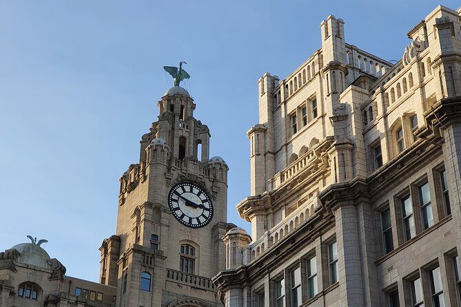 Qualified Guide: Liverpool Waterfront, City Centre & Beatles Tour - Royal Liver Building: skyscraper bragging rights and giant clock faces