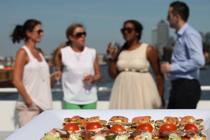 River Thames Evening Cruise with Sparkling wine and Canapés - Where you board: Tower Millennium Pier and what to expect on arrival