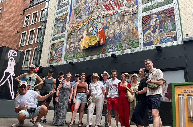 Rock & Roll Walking Tour of Soho (Private Group Booking) - Outside a famous department store: creation stories that explain the street