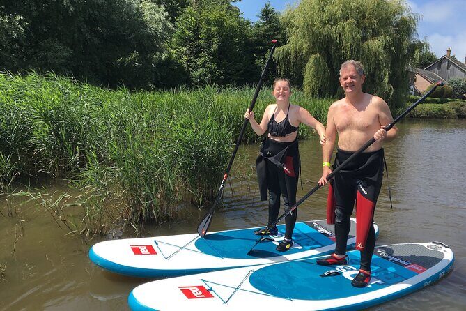 Stand Up Paddle Boarding Journey Down Bude Canal - Getting kitted up: inflatable boards, paddles, and wetsuits