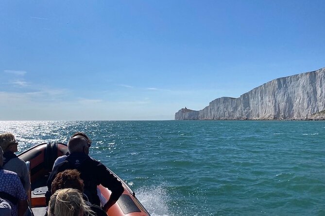 The Seven Sisters & Beachy Head Lighthouse Boat Trip Adventure - Beachy Head Lighthouse: 162 m Chalk Cliffs and a Red-and-White Icon